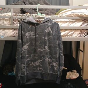 A Camo Hoodie with a hood.